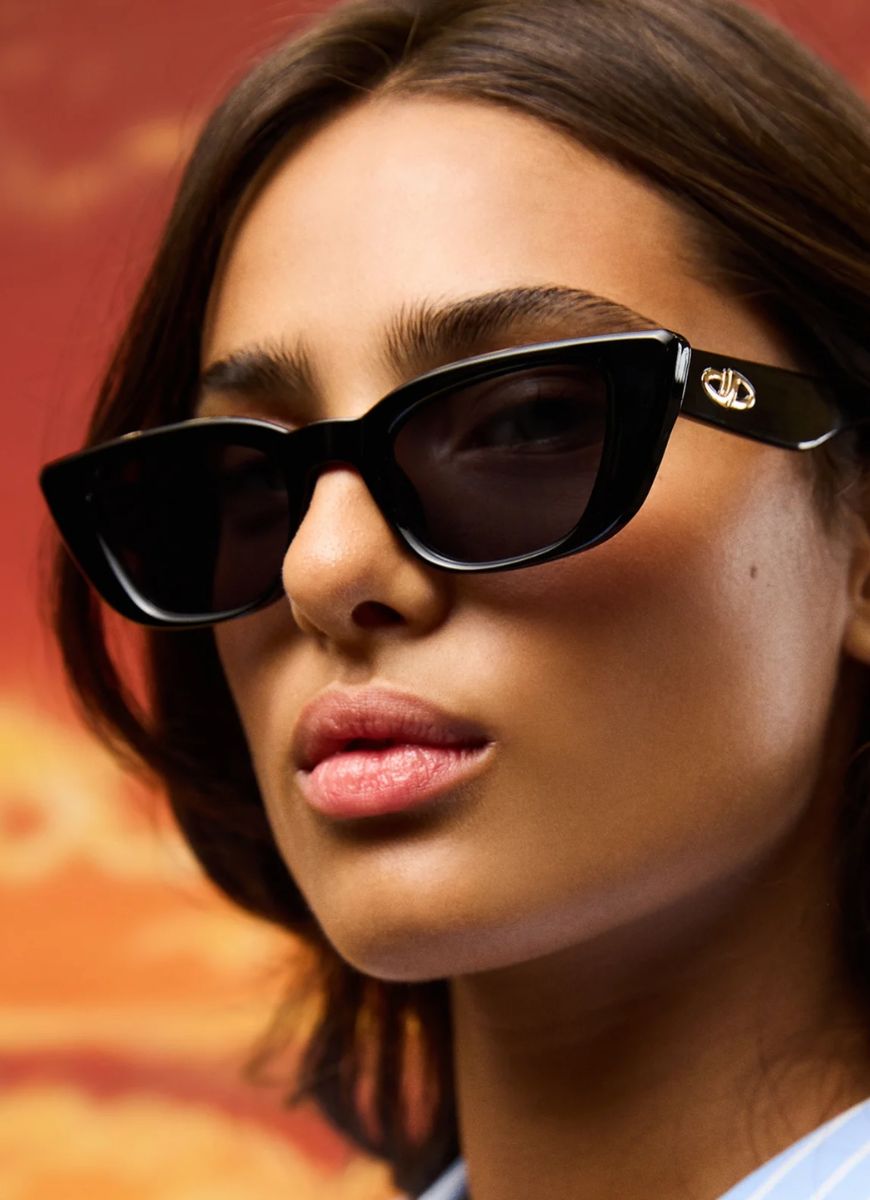 Le Specs Dream Lover Sunglasses in Black Shown on Model