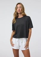 vuori Women's Energy Tee in Black Front View