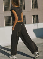 Free People Hot Shot Crossover Set in Black Back View With Model Walking Away