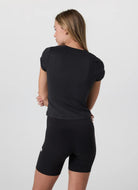 Vuori Women's Halo Baby Tee in Black Back View