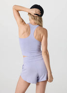 Vuori Women's Halo Performance Crop Tank 2.0 in Lavender Mist Heather Back View