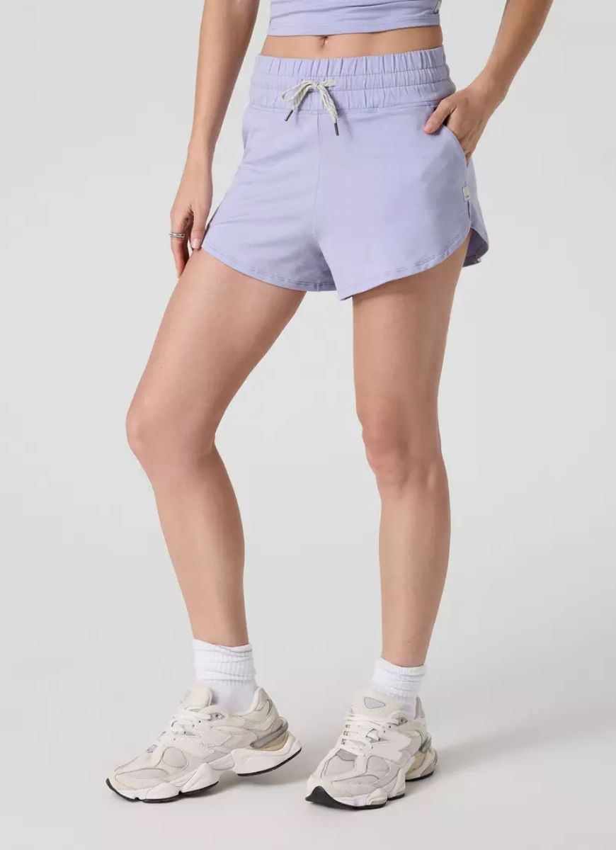 Vuori Women's Halo Performance Short 2.0 in Lavender Mist Heather Front View With Hand in Pocket