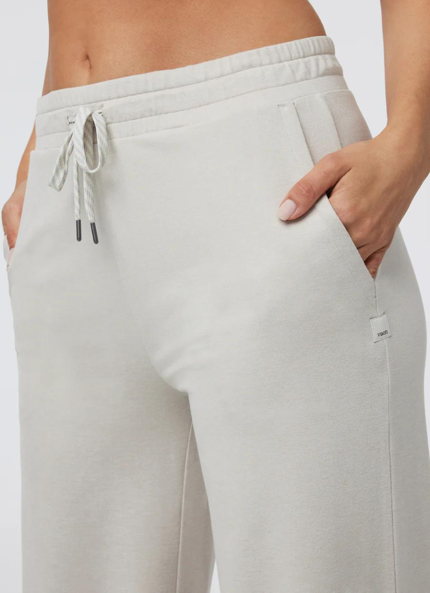 Vuori Halo Essential Wideleg Pant in Ecru Heather Close Up View of Hand in Pocket