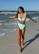 BEACH RIOT Highway Bikini Bottom in Blueberry Ice Full Length Front View on Beach