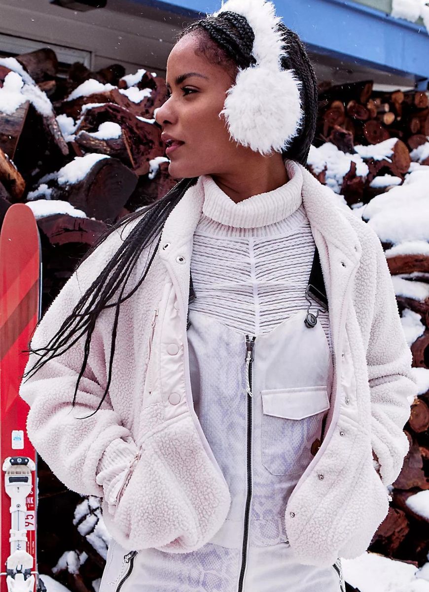 Free People Hit The Slopes Women's Jacket in Canvas Front View Unzipped with Model Posing with Skis