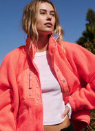 Free People Hit The Slopes Jacket in Neon Coral Front View Unzipped