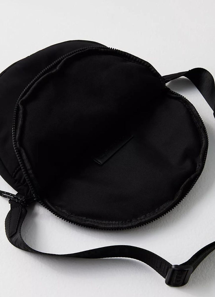 Free People Hit The Trails Sling Bag in Black Close Up View Laying Flat
