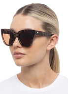 Le Specs Liar Liar Women's Sunglasses in Volcanic Tort Shown on Model Side View