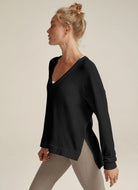 Beyond Yoga Long Weekend Lounge Pullover in Black Side View