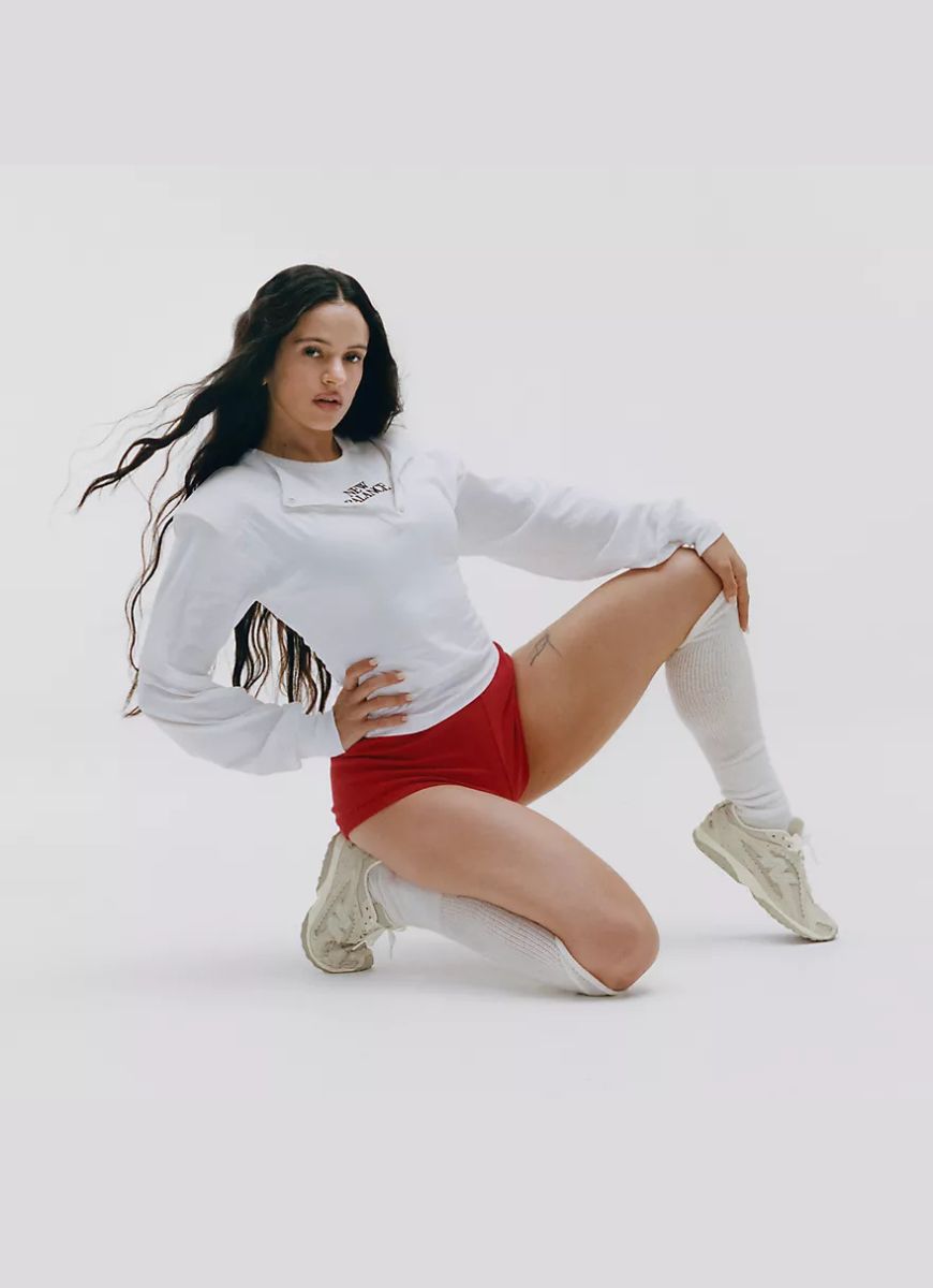 New Balance Women's 204L Sneaker in Sea Salt With Linen Shown on Model in a Pose