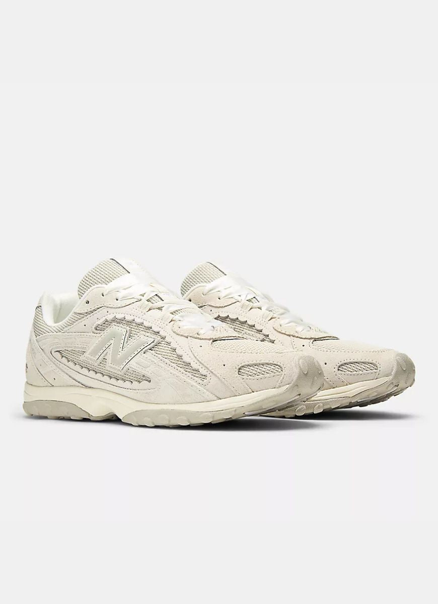 New Balance Women's 204L Sneaker in Sea Salt With Linen Angled Side View