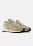New Balance 574 Women's Sneaker in Beige Angled Side View