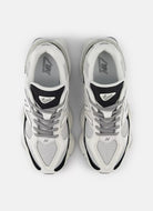 New Balance Women's 9060 Sneaker in Black/Reflection