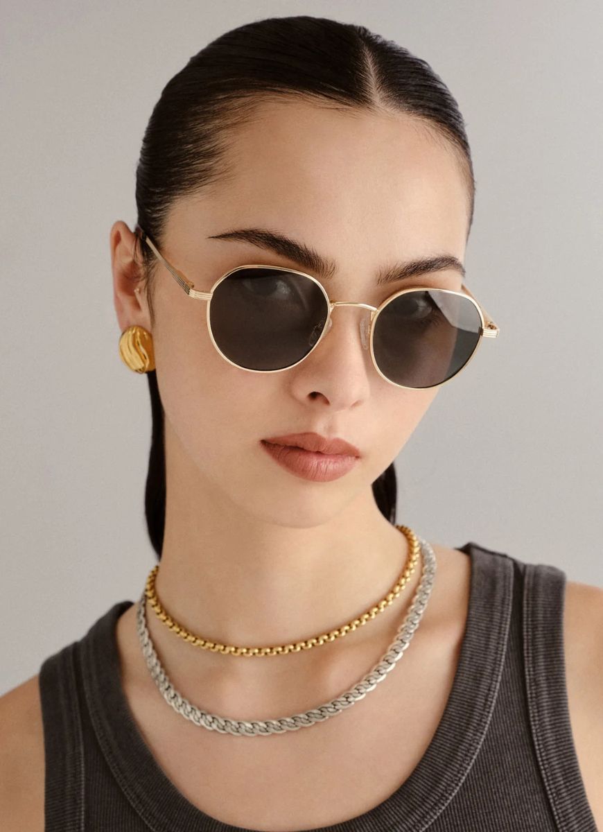 Le Specs Odyssey Sunglasses in Gold Khaki Shown on Model