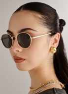 Le Specs Odyssey Sunglasses in Gold Khaki Side View on Model