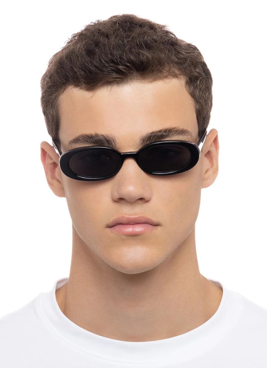 Le Specs Outta Love Sunglasses in Black Shown on Male Model