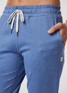 Vuori Performance Jogger in Blue Quartz Heather Close Up View of Hand in Pocket
