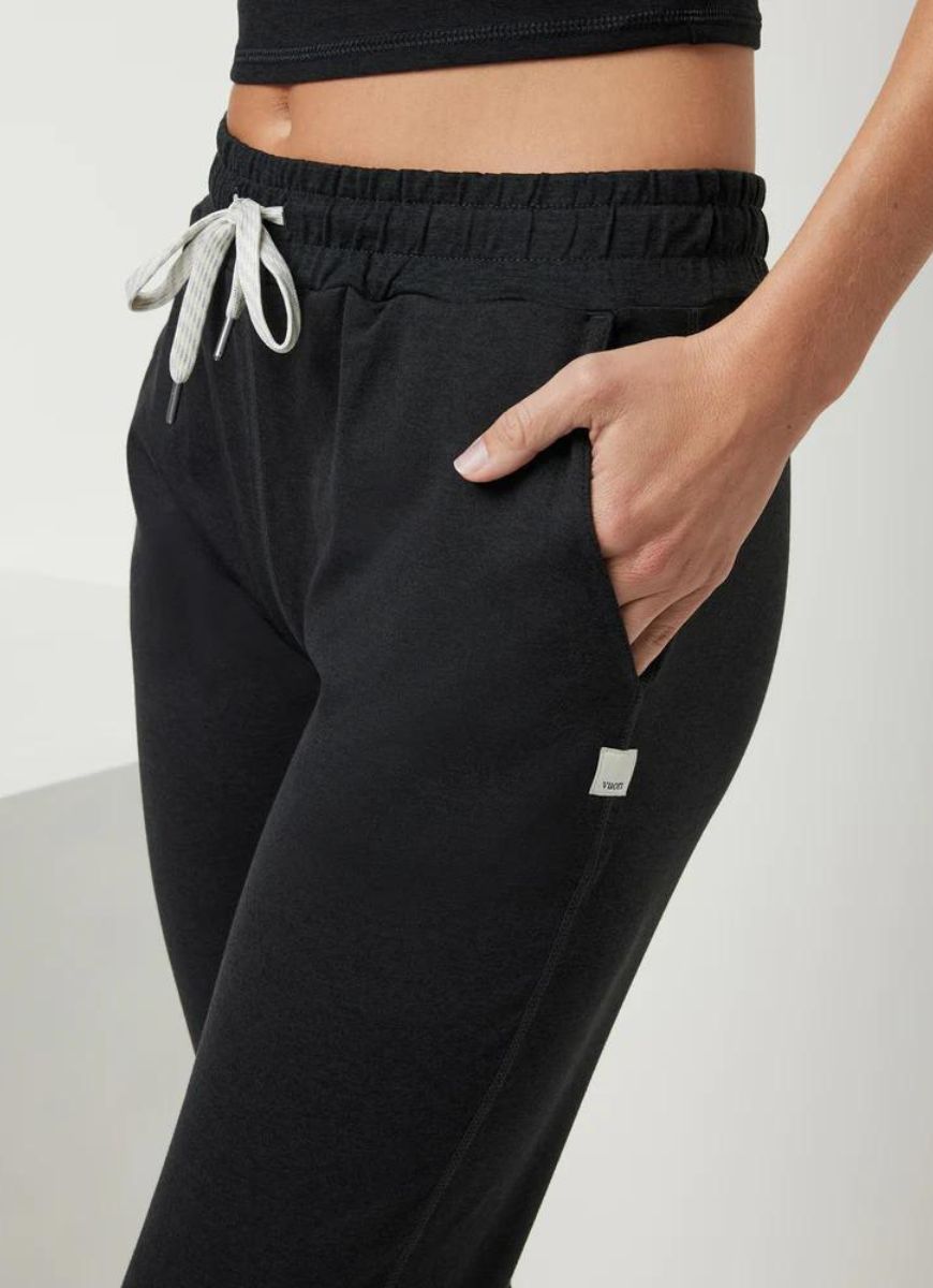 Vuori Women's Performance Jogger in Black Close Up Side View of Hand in Pocket