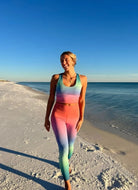 BEACH RIOT Piper Legging in High Tide Ombre Front View Model Walking on Beach