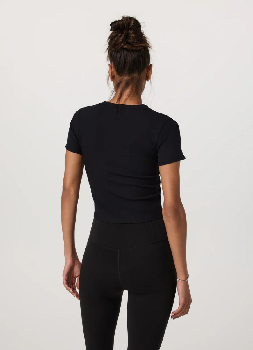 Vuori Women's Pose Fitted Tee in Black Back View