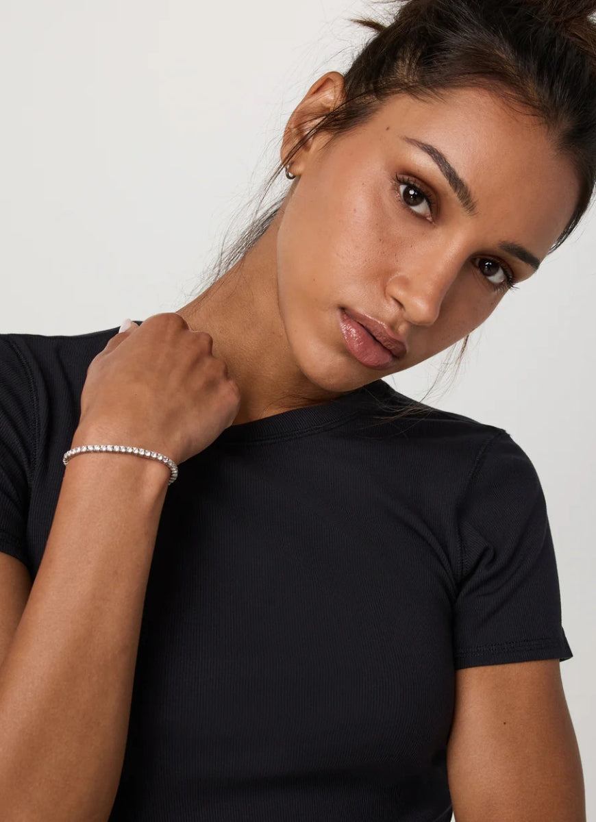 Vuori Women's Pose Fitted Tee in Black Close Up Front View