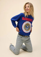 DAYDREAMER Ramones Gold Seal Reverse Crew Sweatshirt in Blue Quartz Model Kneeling in a Pose