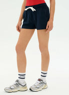 Splits59 Reena Women's Sweatshort in Indigo Angled Side and Front View