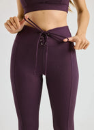 Year of Ours Ribbed Football Legging in Deep Plum Close Up Front View of Laces