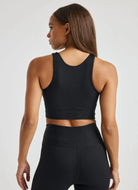 YEAR OF OURS Ribbed Gym Bra in Black Back View