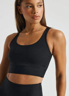 YEAR OF OURS Ribbed Gym Bra in Black Close Up Front View