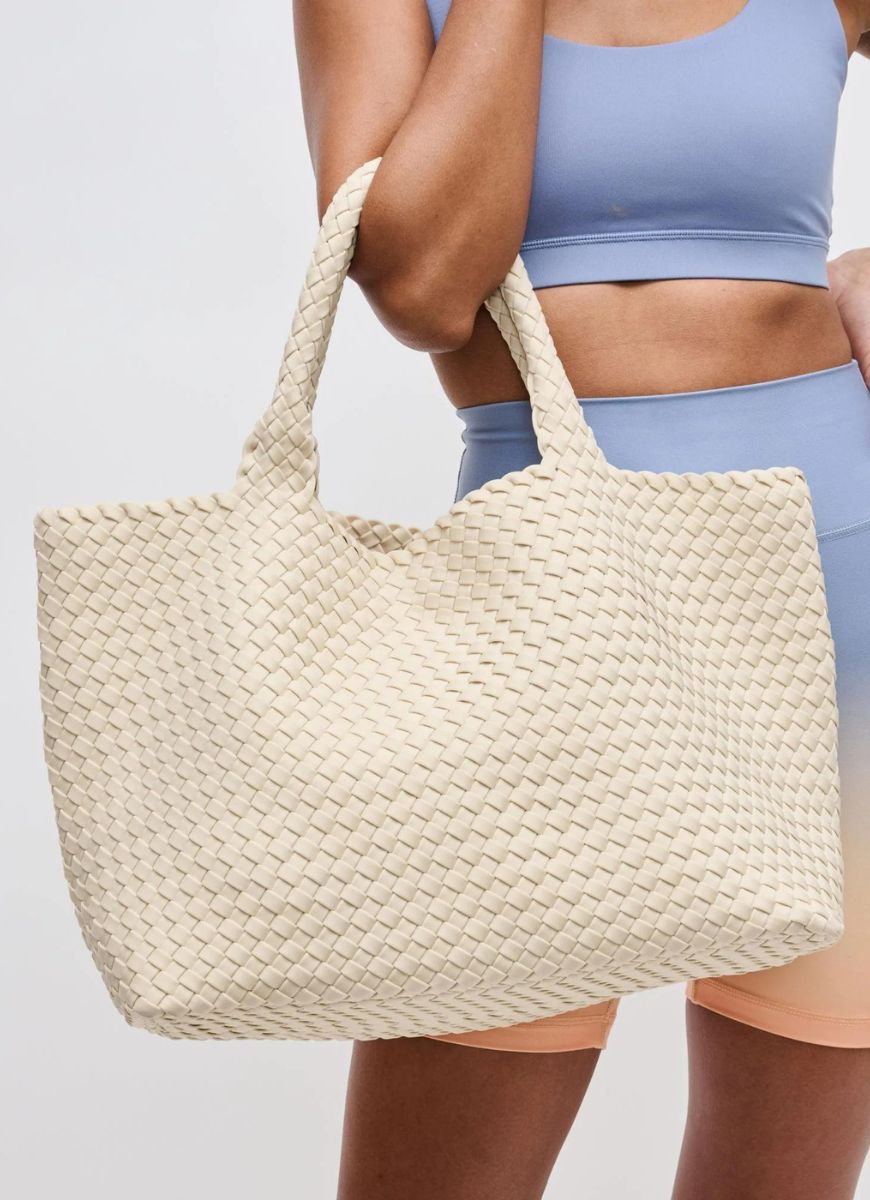 Sol and Selene Sky’s The Limit Large Tote in Cream Front View Shown on Model's Arm