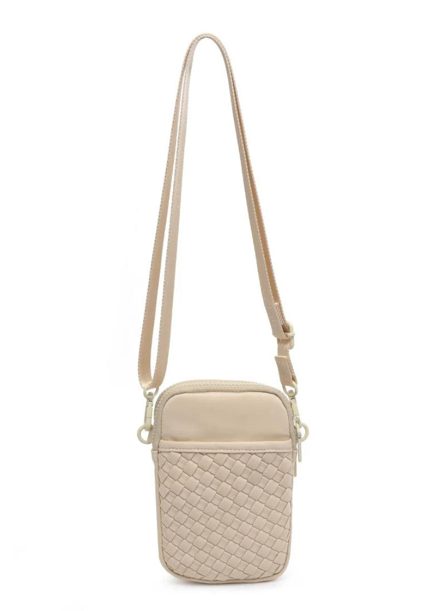 SOL AND SELENE Divide & Conquer Woven Neoprene Crossbody in Cream Front View Showing Strap