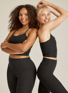 Beyond Yoga Slim Racerback Cropped Women's Tank in Darkest Night Shown on Two Models Posing
