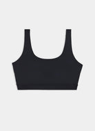 Black sports bra on a light gray background