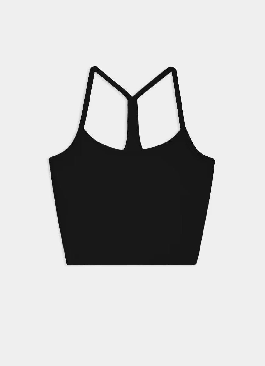 Black crop top with thin straps on a light gray background