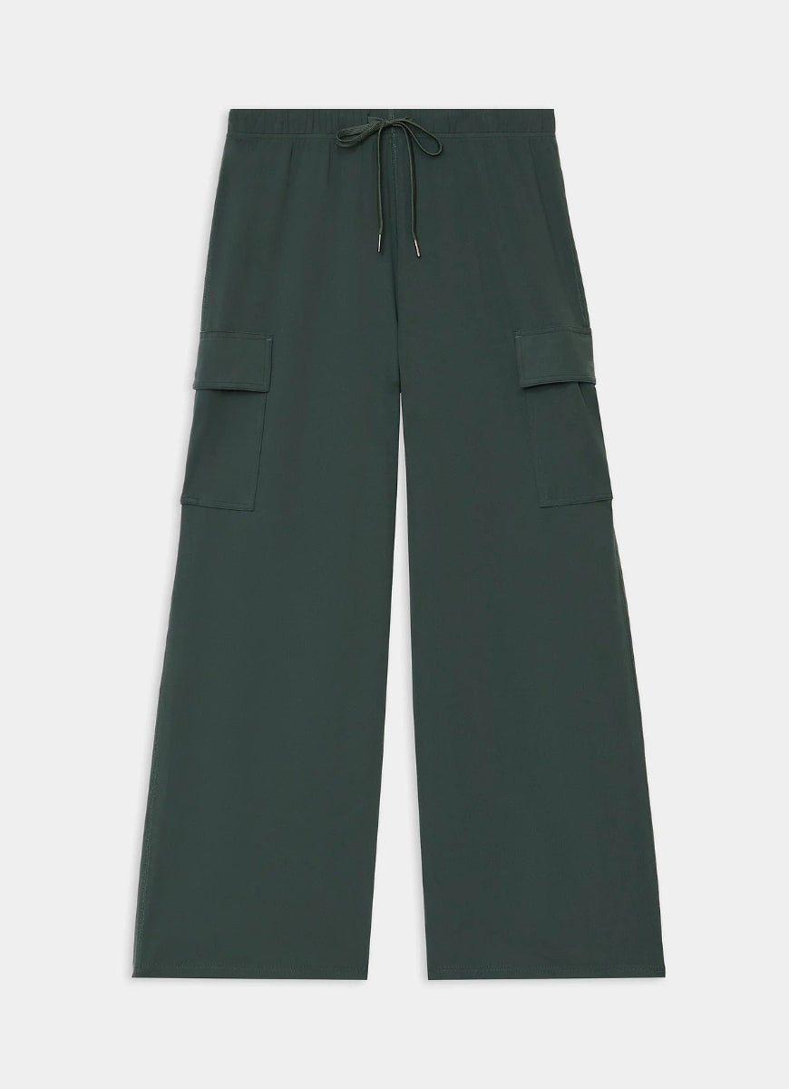 Green cargo pants on a light gray background