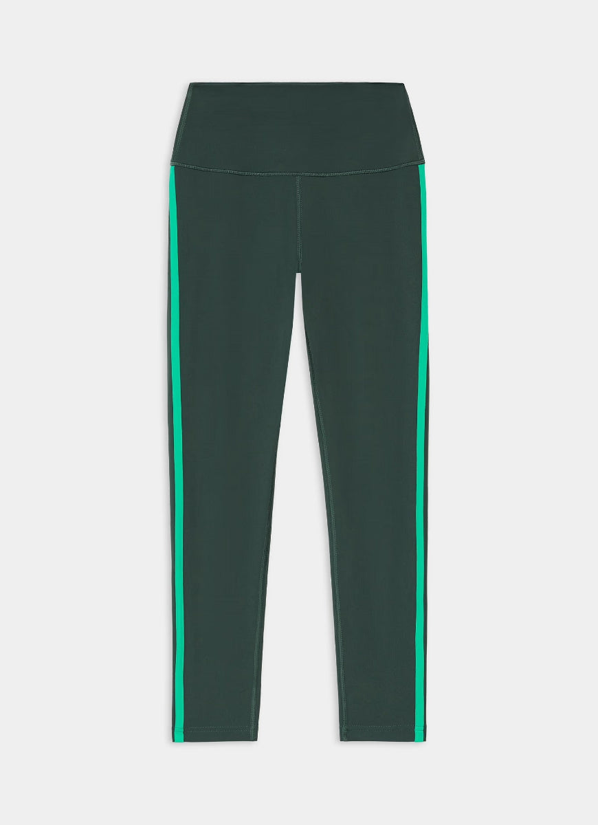 Green leggings with a color block design on a white background