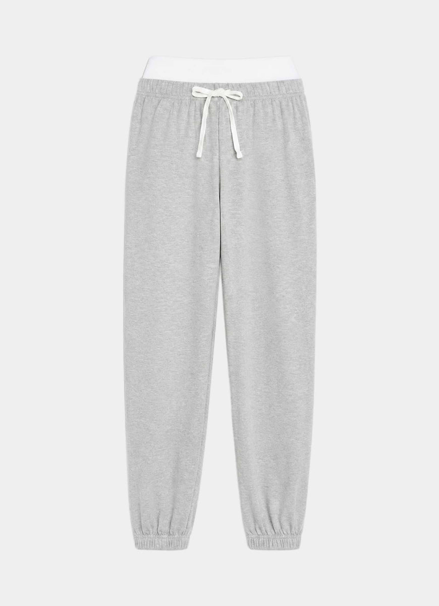 Light gray heather jogger pants with a white elastic waistband, white drawstring, and elastic cuffs, shown against a light gray background.