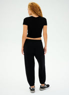Splits59 Andie Oversized Fleece Sweatpant in Black Full Length Back View