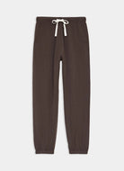 Brown sweatpants with a white drawstring on a light gray background