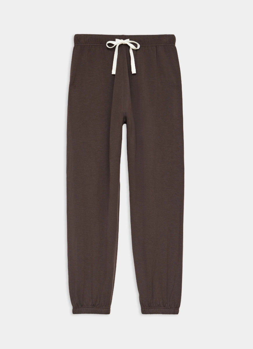 Brown sweatpants with a white drawstring on a light gray background