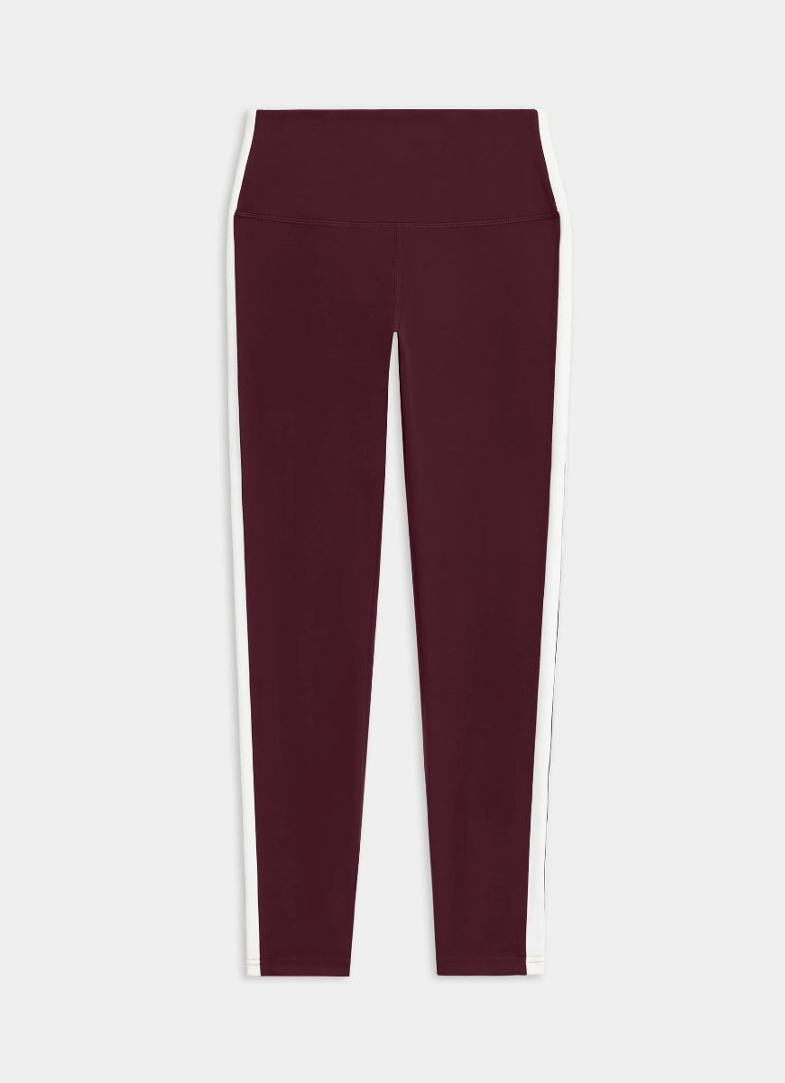 Maroon leggings on a white background