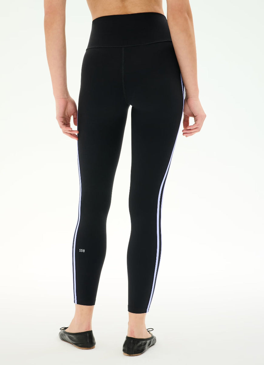 Black high-waisted leggings with white side stripes, shown on a model from the back against a white studio background.