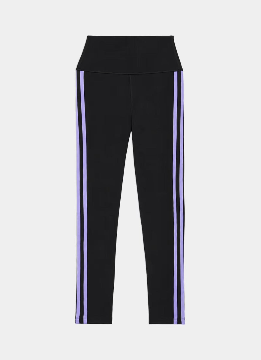 Black high-waisted leggings with two vertical light purple stripes down the sides, shown against a light gray background.
