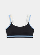 Black sports bra with white and blue trim on a light gray background