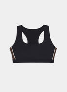 Black sports bra with white accents on a light gray background