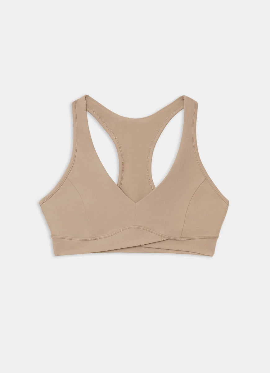Beige sports bra on a light gray background