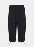 Black cargo pants on a light gray background