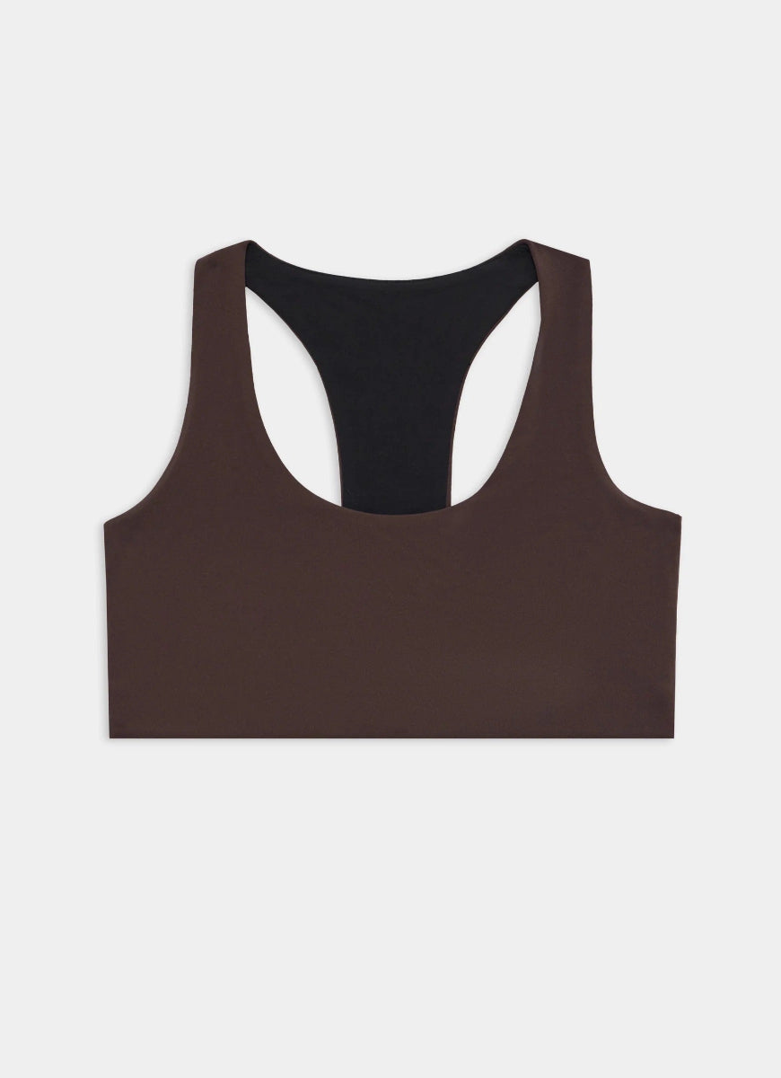 Brown tank top with black interior on a light gray background