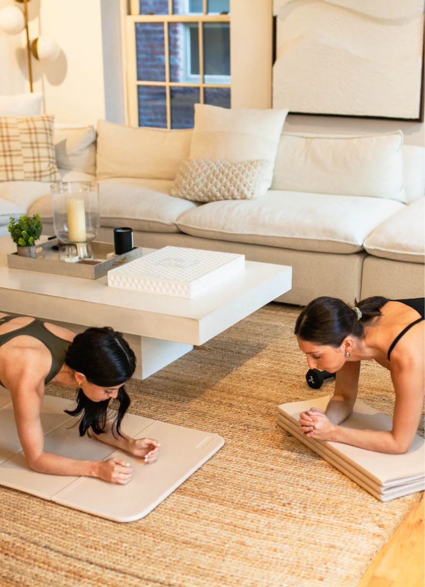 stakt The Stakt 2-in-1 Yoga Mat & Block in Dune Shown Being Used in a Living Room
